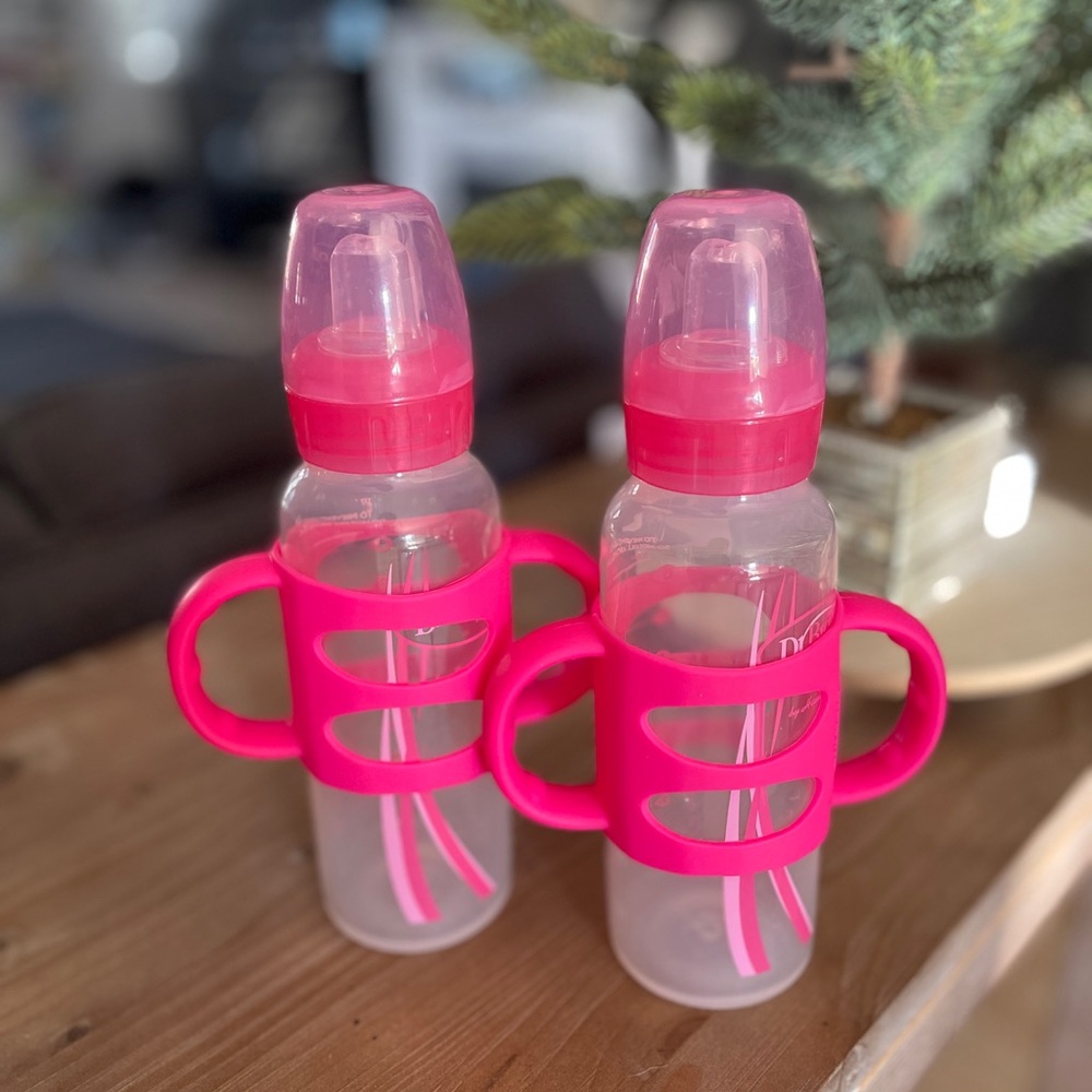 Two pink Dr. Browns sippy cups